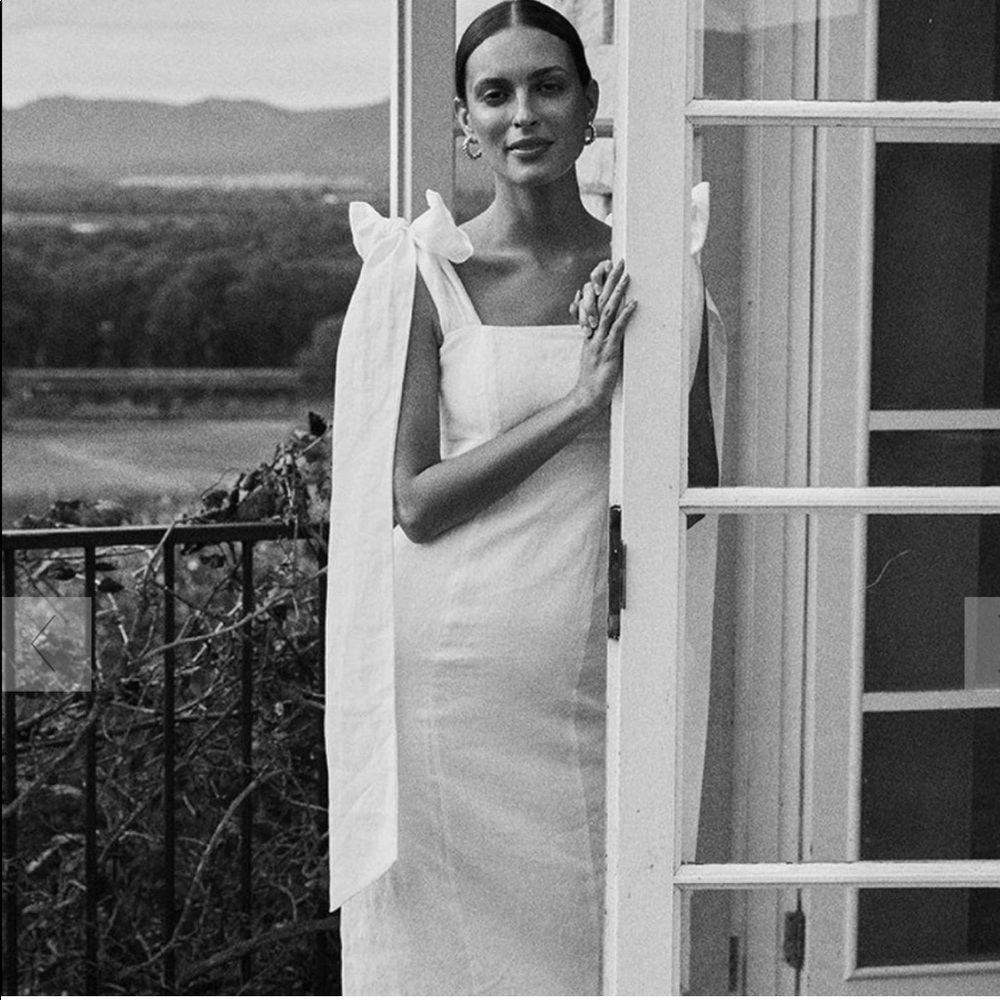 DISSH AISLE WHITE LINEN BOW MIDI DRESS
